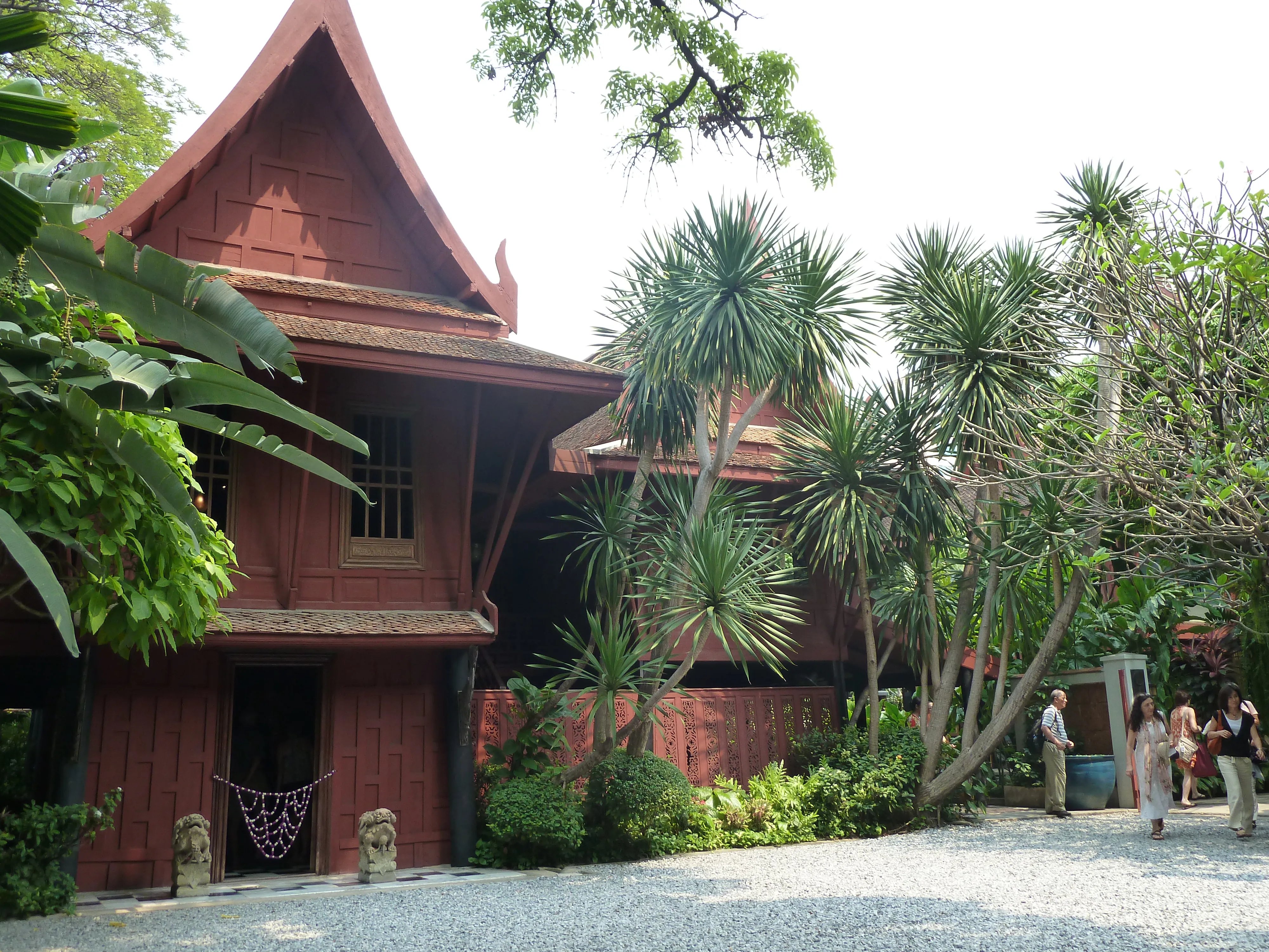 Traditional Thai teak house with steep roofs, the Jim Thompson House complex in Bangkok.
